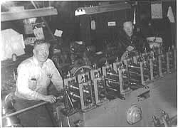 Ed Johnson, Sr., and Harold Johnson preparing machine for sale at Cicero Avenue.